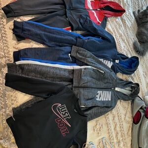 Nike Kids' Hoodie and Jogger Collection in Red, Blue, and Gray